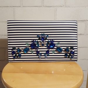 Navy and white embellished clutch